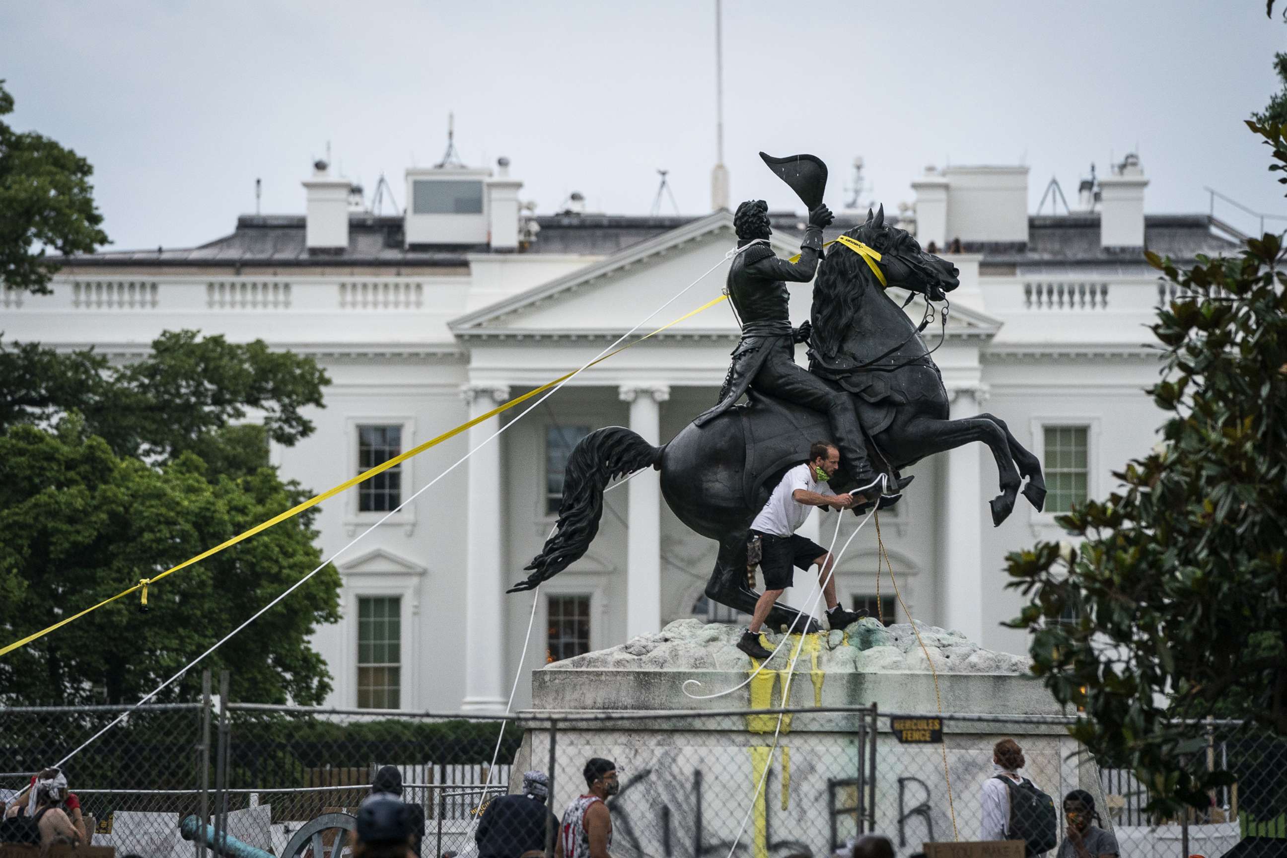 PHOTO: Protesters attempt to pull down the statue of Andrew Jackson in Lafayette Square near the White House on June 22, 2020, in Washington, DC.