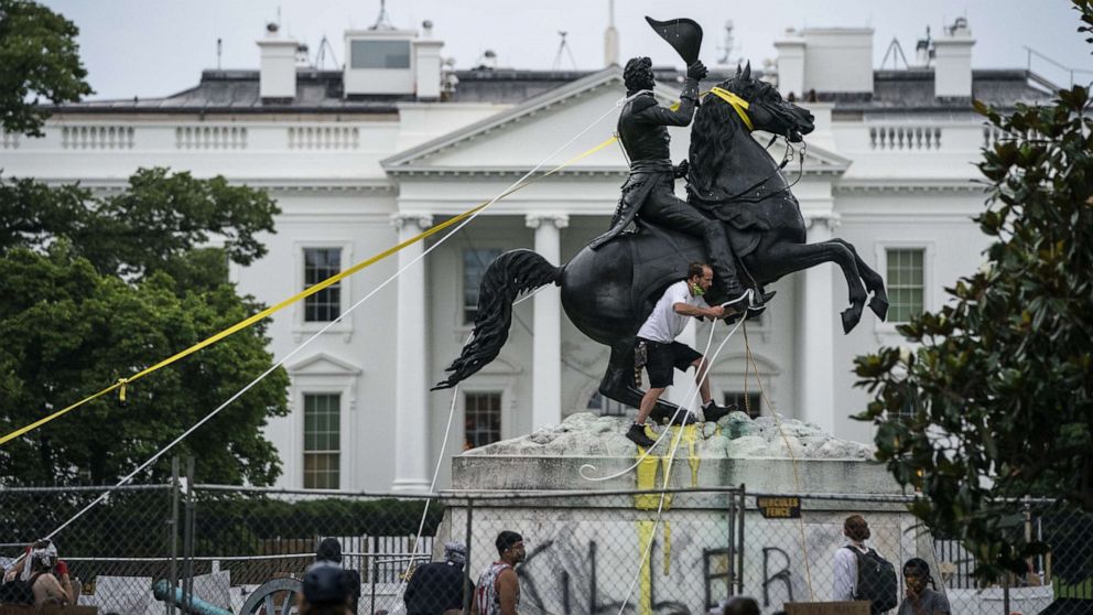 PHOTO: Protesters attempt to pull down the statue of Andrew Jackson in Lafayette Square near the White House on June 22, 2020, in Washington, DC.