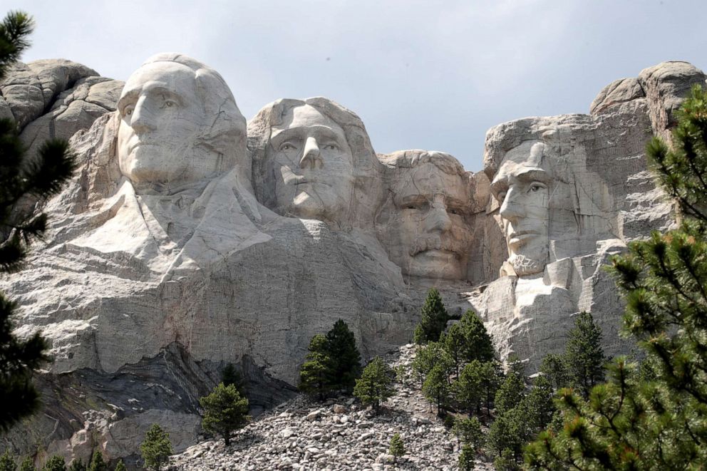 PHOTO: The busts of Presidents George Washington, Thomas Jefferson, Theodore Roosevelt and Abraham Lincoln tower over the Black Hills at Mount Rushmore National Monument in Keystone, South Dakota, on July 01, 2020.
