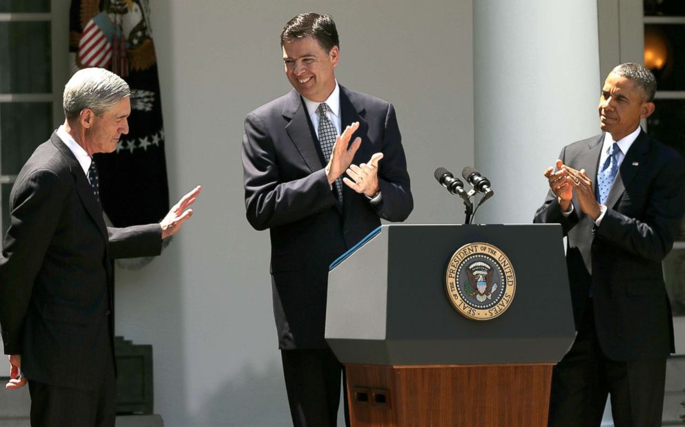 PHOTO: Barack Obama and James Comey applaud outgoing FBI Director Robert Mueller during a ceremony announcing Comey's nomination in the Rose Garden of the White House June 21, 2013, in Washington, DC.