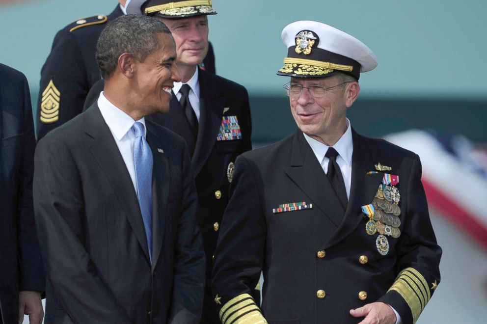 PHOTO: President Barack Obama shares a moment with outgoing chairman of the Joint Chiefs of Staff Adm. Mike Mullen during the Chairman of the Joint Chiefs of Staff change of responsibility ceremony at Joint Base Myer-Henderson Hall, Va., Sept. 30, 2011.