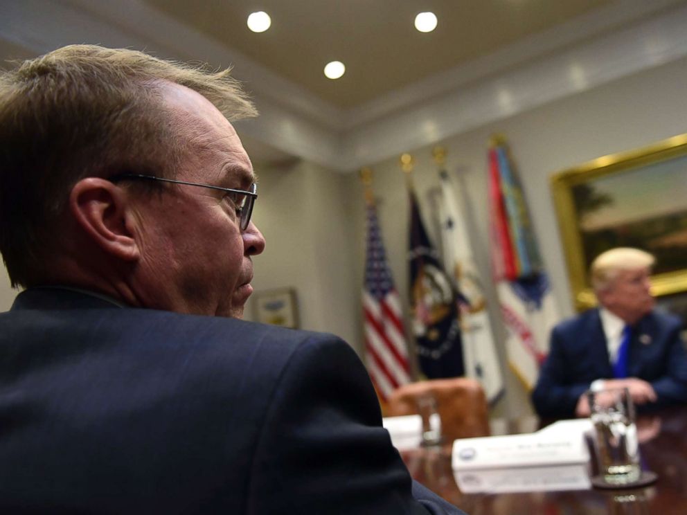 PHOTO: White House budget director Mick Mulvaney, left, attends a meeting with President Donald Trump, right, in the Roosevelt Room of the White House, Nov. 28, 2017, with Republican congressional leaders.