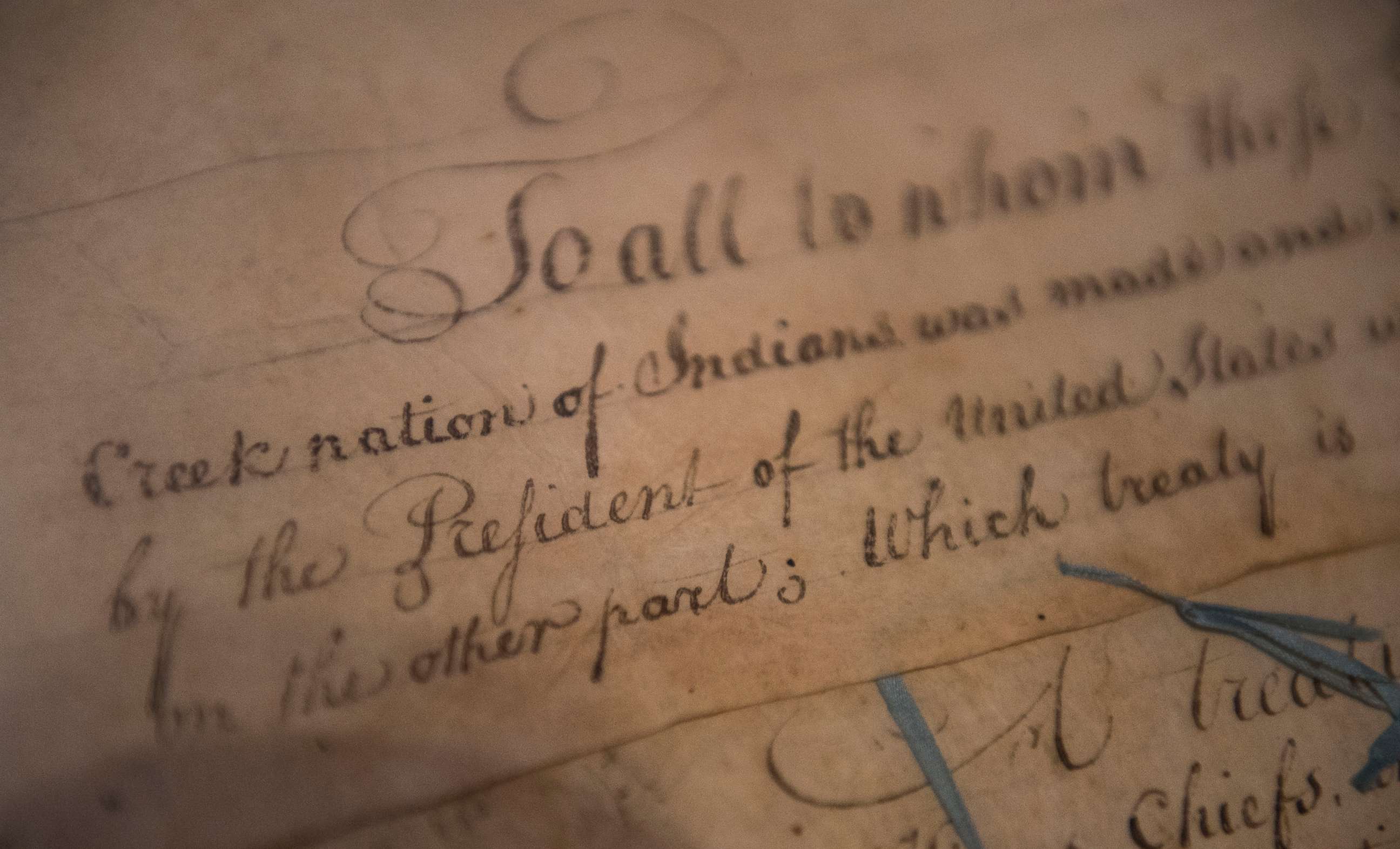 PHOTO: A detail of the 1790 Treaty of the Muscogee Creek Nations and the United States sits on display at the Smithsonian's National Museum of the American Indian  on March 16, 2015 in Washington.