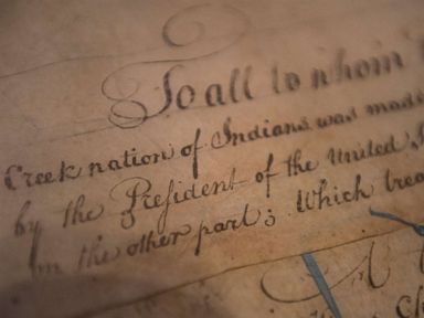 PHOTO: A detail of the 1790 Treaty of the Muscogee Creek Nations and the United States sits on display at the Smithsonians National Museum of the American Indian on March 16, 2015 in Washington.