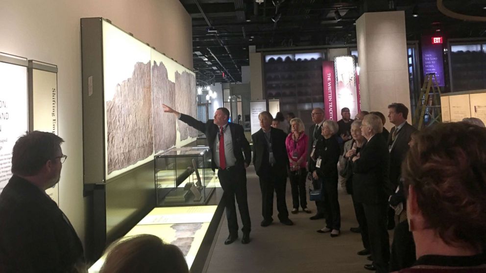 PHOTO: Visitors tour the "History of the Bible" exhibit, in Washington.