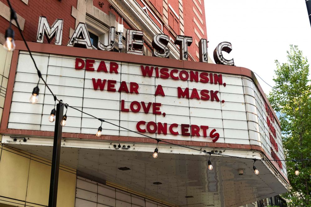 PHOTO: A sign reads "Wear A Mask" outside the Majestic Theatre music venue in Madison, Wis., Sept. 23, 2020. 