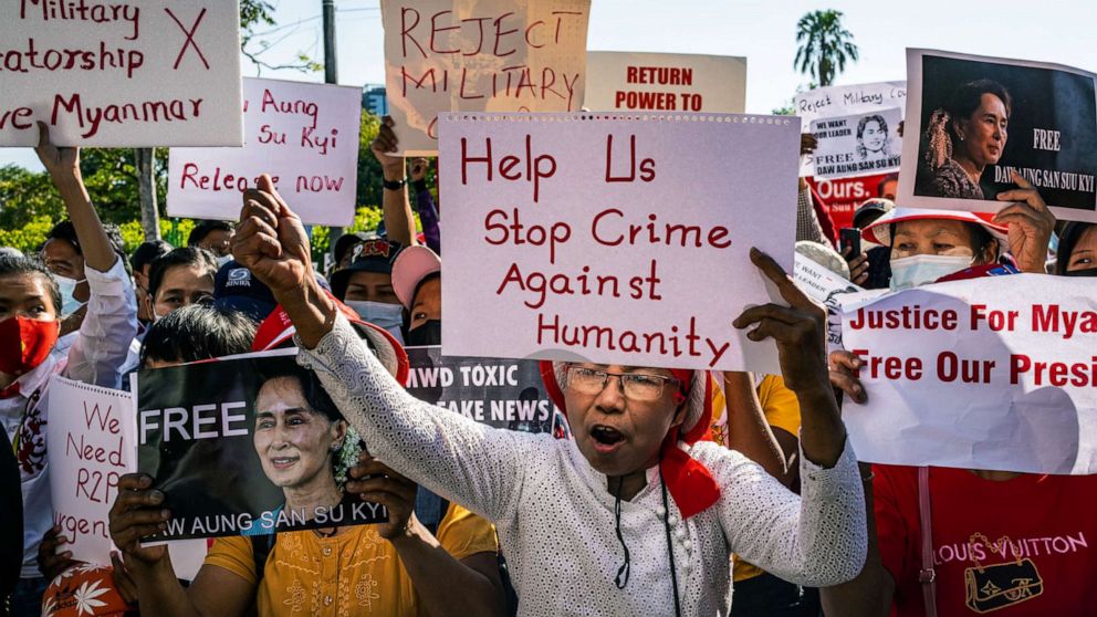 PHOTO: Protesters shout slogans in front of the United Nations Development Program (UNDP) office, Feb. 11, 2021 in Yangon, Myanmar.