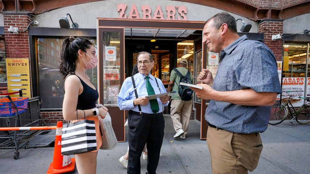 PHOTO: Rep. Jerry Nadler, center, and New York City Comptroller Brad Lander, right, speak to a Nadler supporter while campaigning outside Zabar's on the Upper West Side of New York, Aug. 20, 2022.