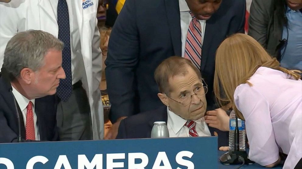 PHOTO: People come to the aid of House Judiciary Committee Chairman Jerrold Nadler who appeared to be suffering from health issue during a news conference in New York City with Mayor Bill de Blasio, left, May 24, 2019.