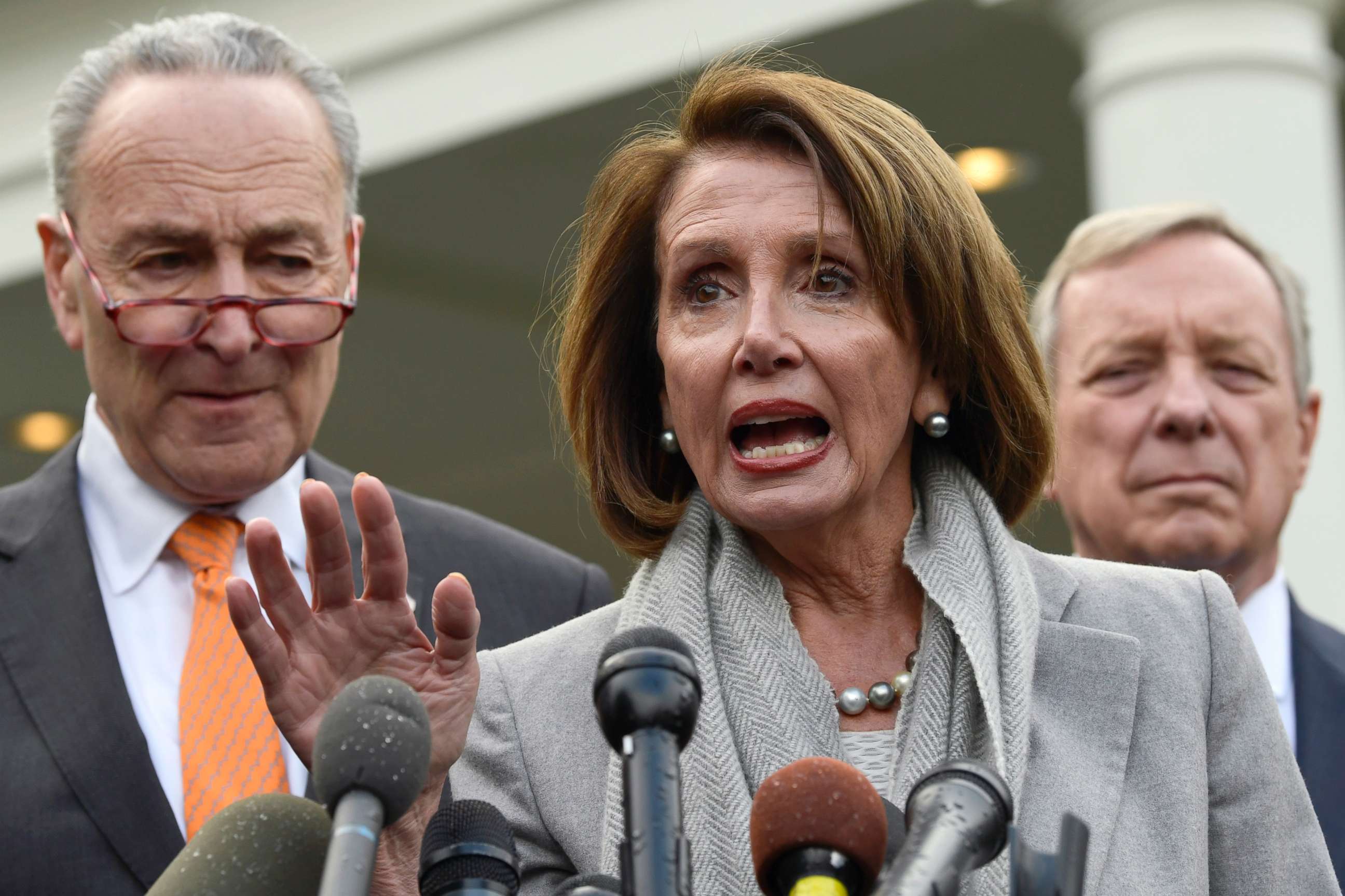 PHOTO: House Speaker Nancy Pelosi of Calif., center, speaks following a meeting with President Donald Trump at the White House, Jan. 9, 2019.