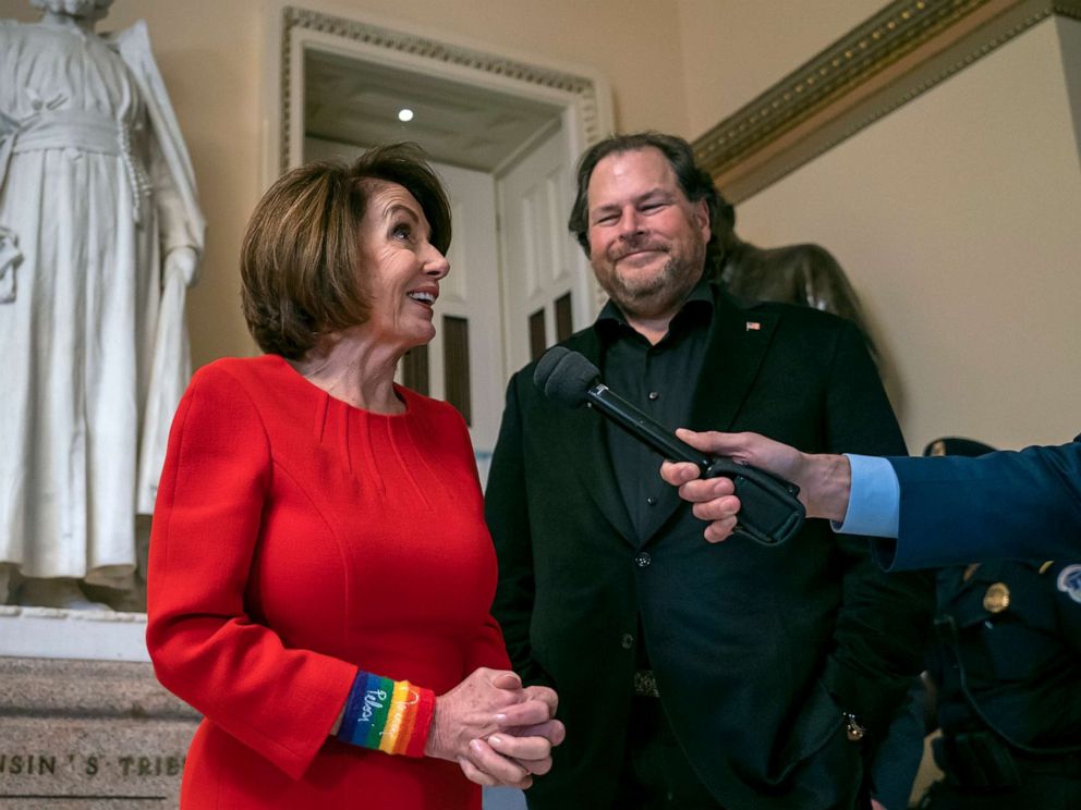 PHOTO: Speaker of the House Nancy Pelosi, joined by internet entrepreneur Marc Benioff, right, arrives for the vote on The Equality Act of 2019 at the Capitol in Washington, May 17, 2019.