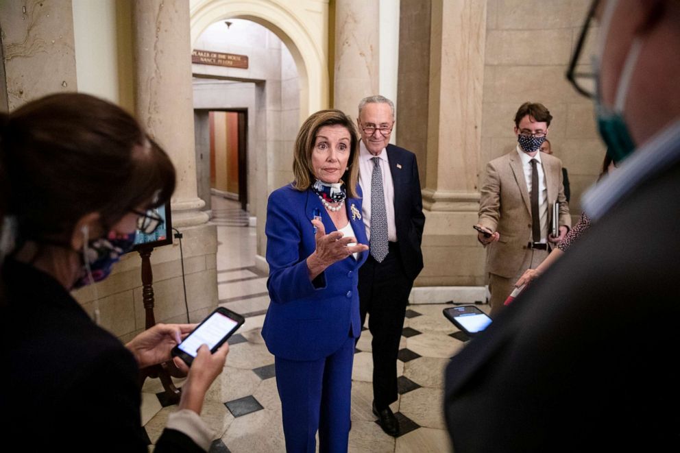 PHOTO: Speaker of the House Nancy Pelosi and Senate Minority Leader Chuck Schumer speak to reporters on the eve of the expiration of the CARES Act on July 30, 2020, in Washington, DC