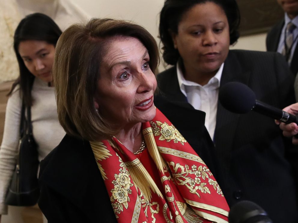 PHOTO: Speaker of the House Nancy Pelosi talks to members of the press about President Donald Trump and the State of the Union speech while she returns to the U.S. Capitol on Jan. 23, 2019 in Washington.
