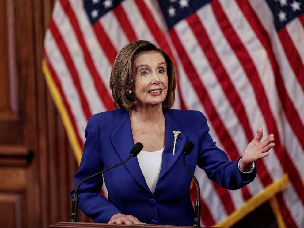 PHOTO: Speaker of the House Nancy Pelosi speaks during a signing ceremony after the House of Representatives approved a $2.2 trillion coronavirus aid package at the U.S. Capitol in Washington, March 27, 2020.