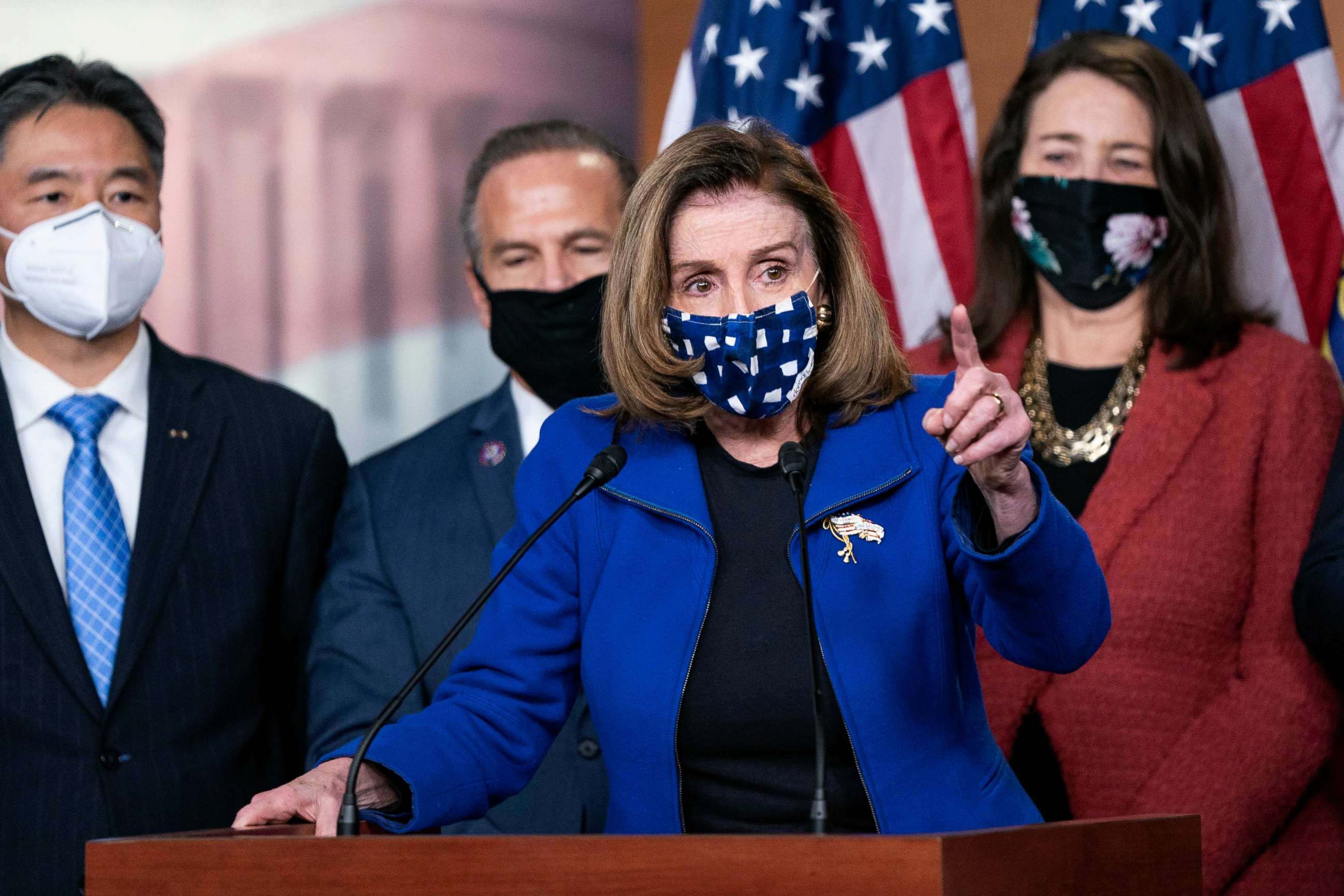 PHOTO: Speaker of the House Nancy Pelosi, with House impeachment managers, speaks to the press after the Senate voted to acquit former President Donald Trump, Feb. 13, 2021, in Washington, DC.