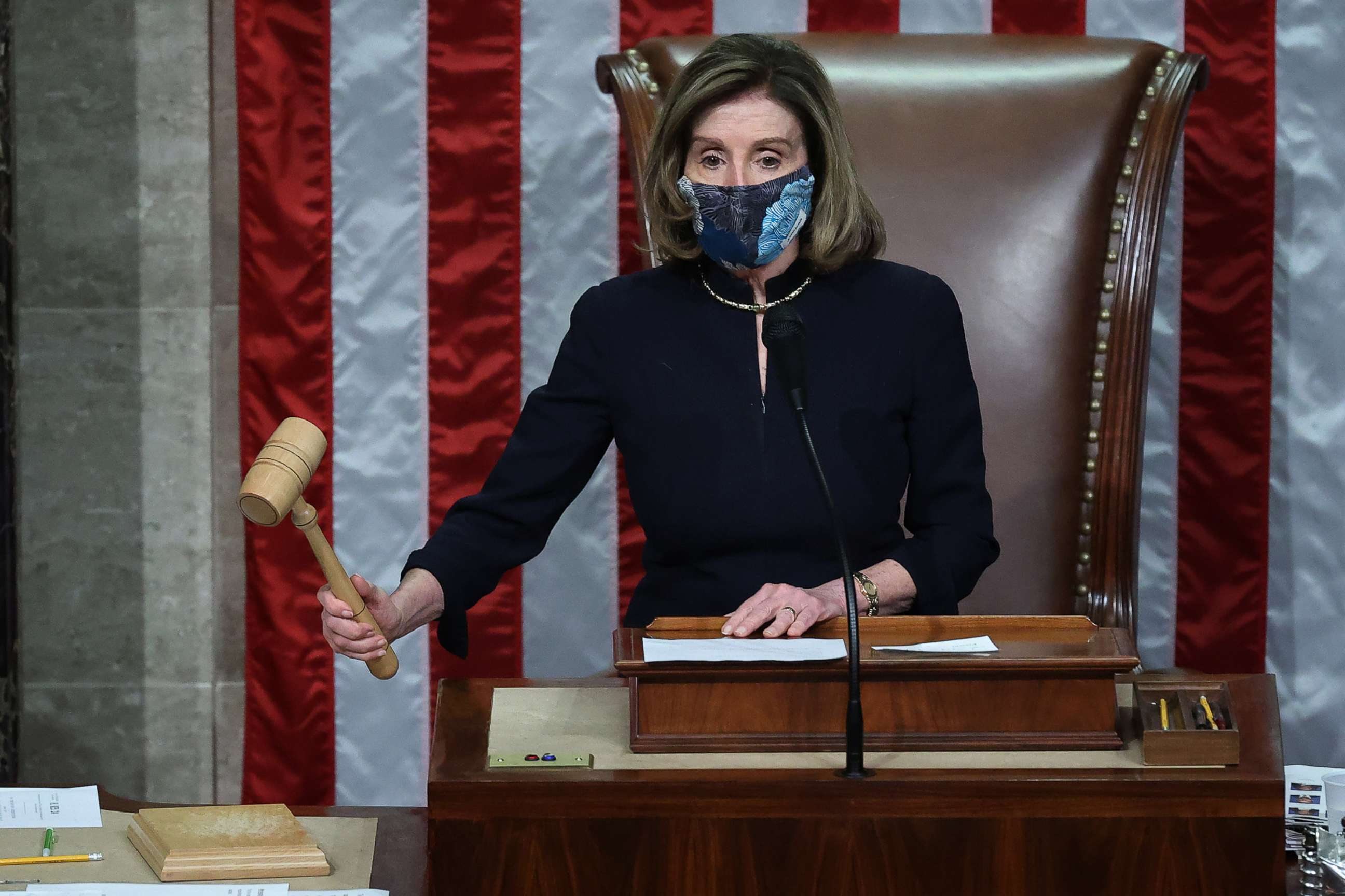 PHOTO: Speaker of the House Nancy Pelosi raps her gavel after the House voted to impeach President Donald Trump for the second time in little over a year in the House Chamber of the U.S. Capitol, Jan. 13, 2021, in Washington, DC.