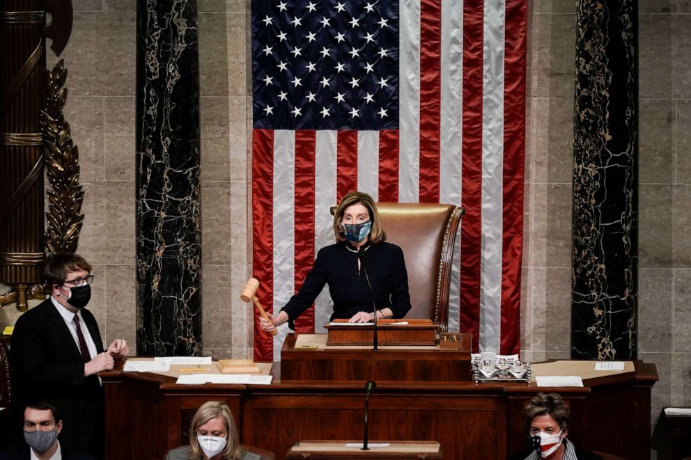 PHOTO: Speaker of the House Nancy Pelosi gavels in the final vote of the impeachment of President Donald Trump for his role in inciting an angry mob to storm the Congress last week, at the Capitol in Washington, Jan. 13, 2021.