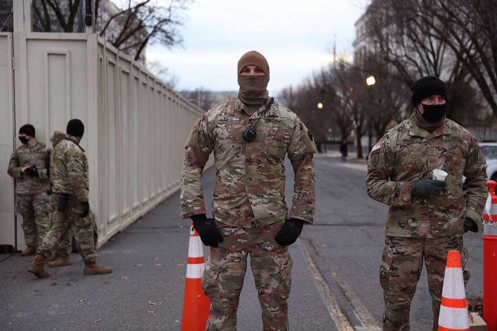 PHOTO: Members of the Maryland National Guard stand guard around the Dirksen and Russell Senate Office Building two days after a pro-Trump mob broke into the U.S. Capitol Building, Jan. 8, 2021, in Washington, D.C.