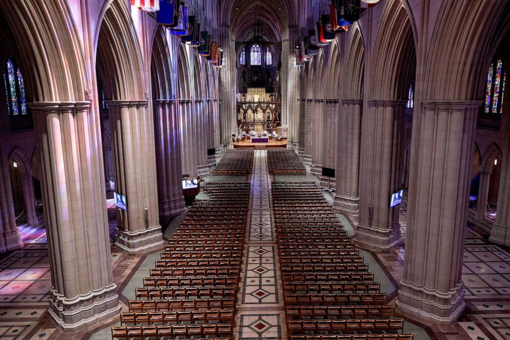 PHOTO: Rev. Dean Randy Hollerith holds Sunday Mass via live-webcast to parishioners at an empty Washington National Cathedral, March 22, 2020, in Washington, DC.