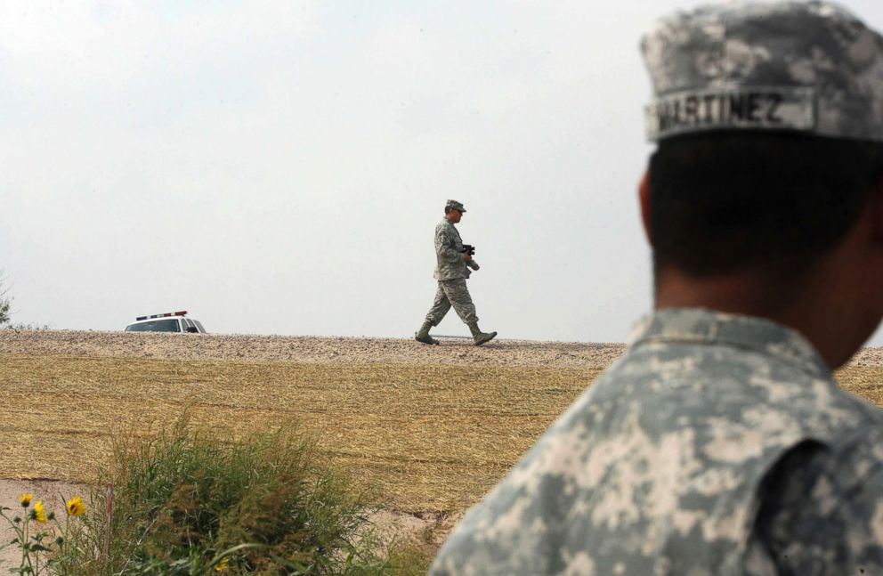 PHOTO: 2011 file photo OF U.S. National Guard troops patrolling near the Hidalgo International Bridge in Hidalgo, Texas. 