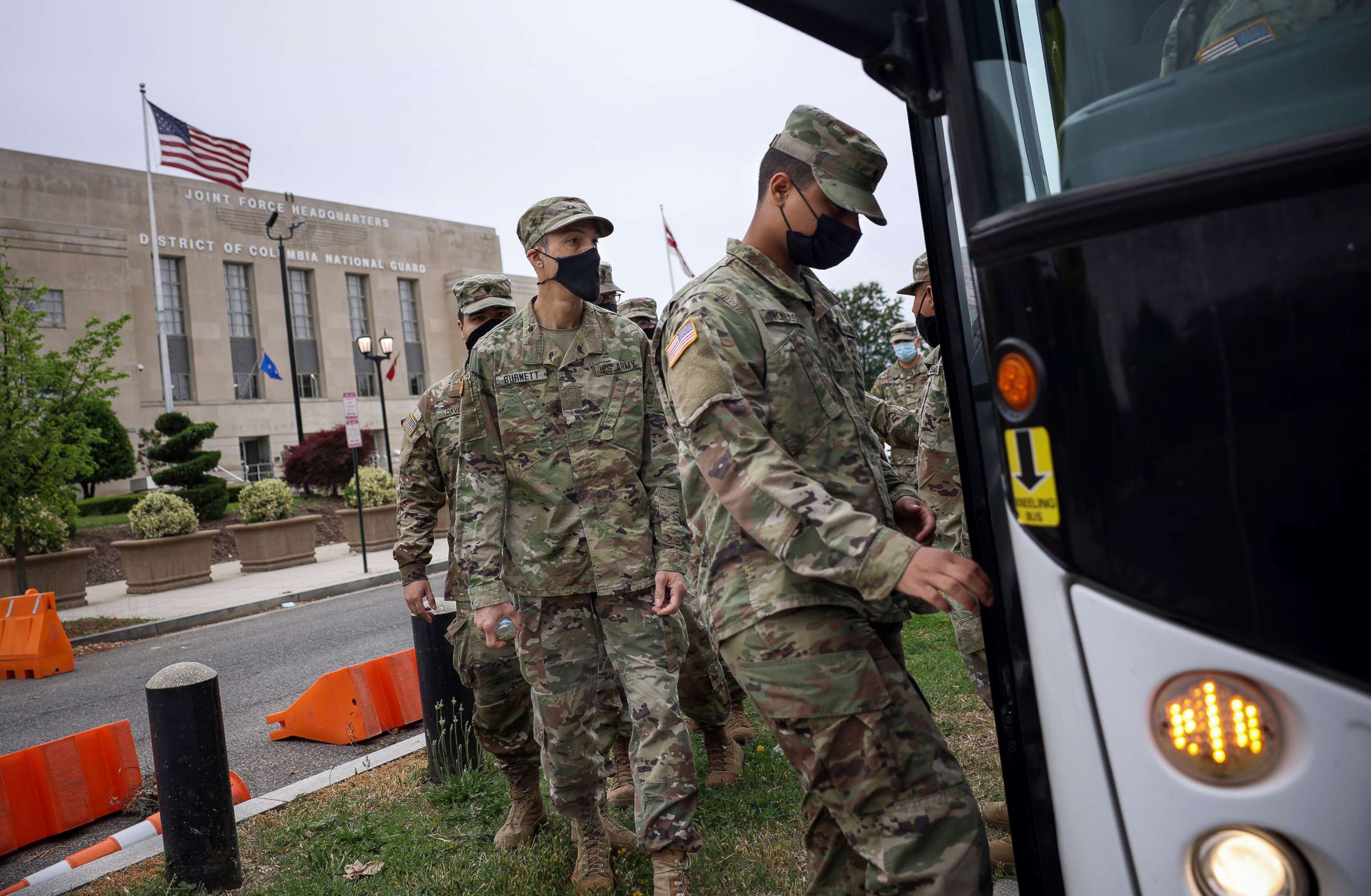 PHOTO: National Guard troops board buses as they leave the Armory after ending their mission of providing security to the U.S. Capitol, May 24, 2021, in Washington, DC.