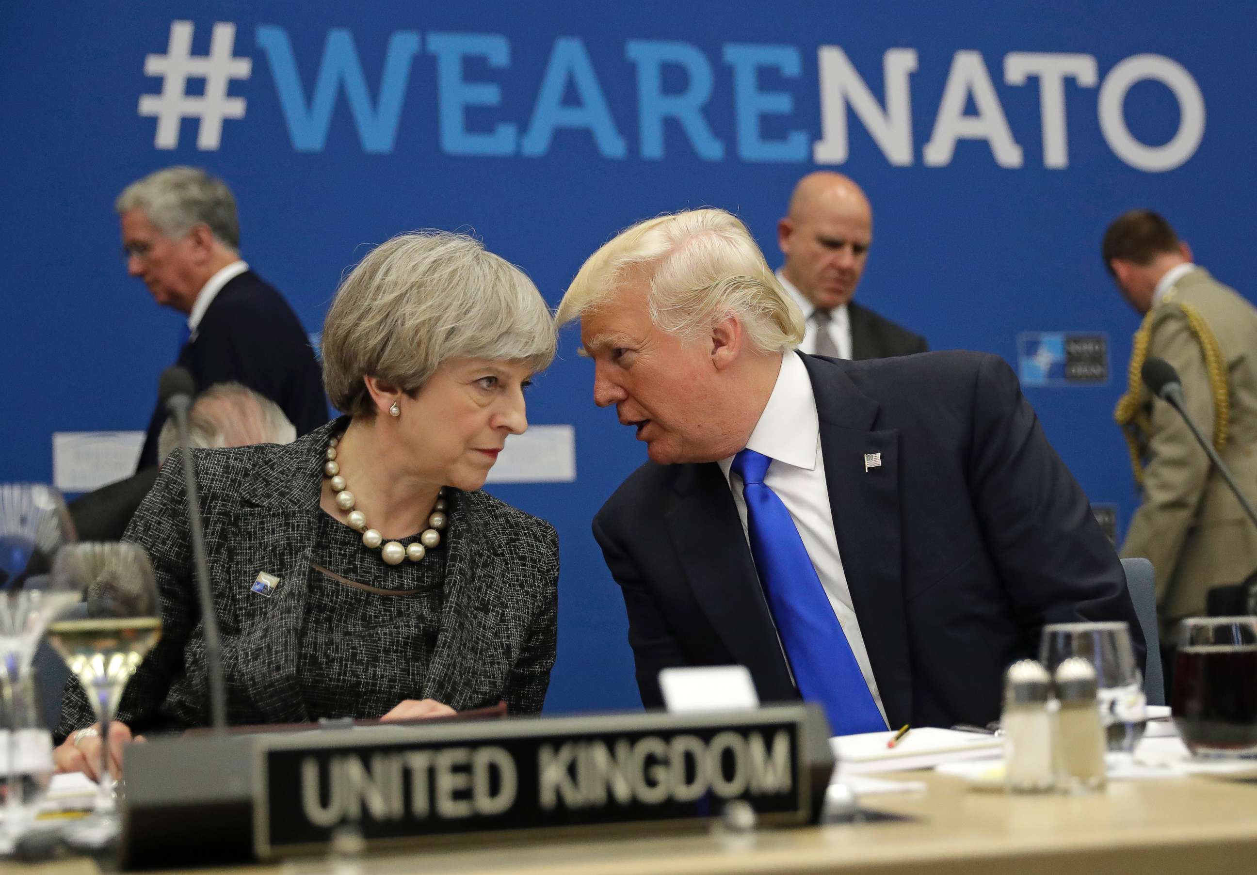 PHOTO: British Prime Minister Theresa May, left, speaks to U.S. President Donald Trump during a working dinner meeting at the NATO headquarters during a NATO summit of heads of state and government in Brussels, May 25, 2017.