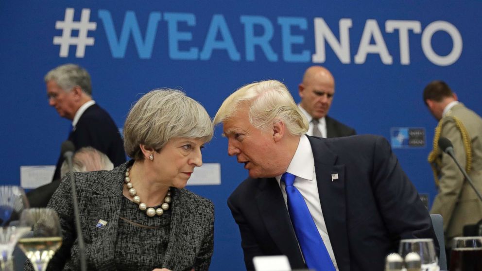 PHOTO: British Prime Minister Theresa May, left, speaks to U.S. President Donald Trump during a working dinner meeting at the NATO headquarters during a NATO summit of heads of state and government in Brussels, May 25, 2017.
