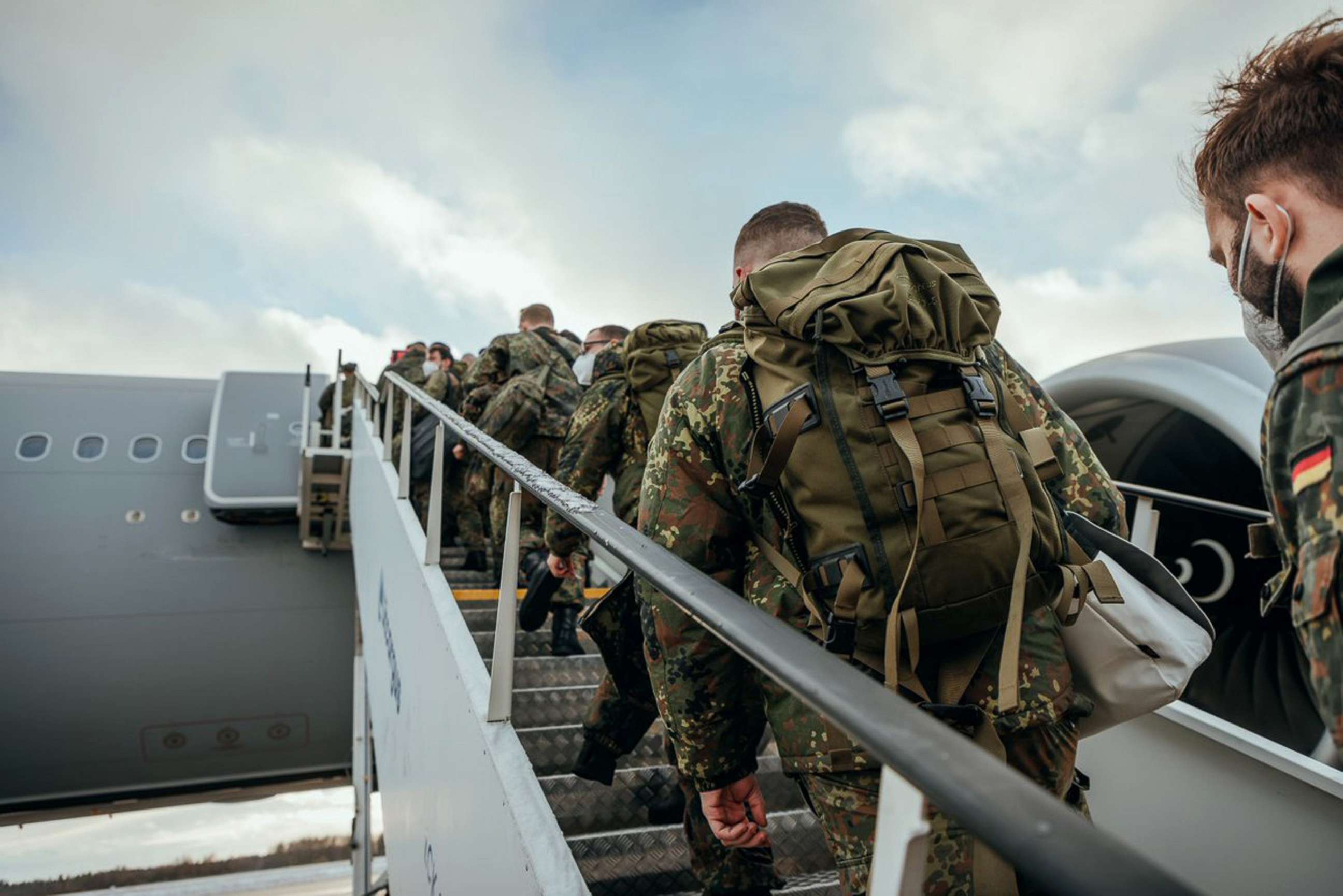 PHOTO: Soldiers from the NATO enhanced Forward Presence Battlegroup depart for Lithuania, Jan. 29, 2022.