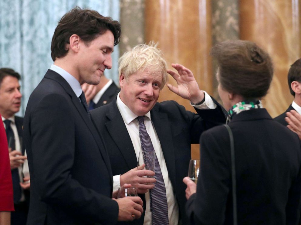 FILE PHOTO: Britains Princess Royal Anne talks to Prime Minister Boris Johnson and Canadian Prime Minister Justin Trudeau during reception at Buckingham Palace to mark 70 years of the NATO Alliance.