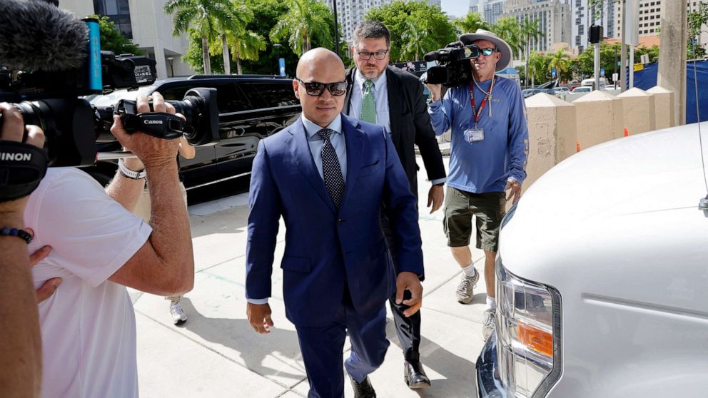 PHOTO: Walt Nauta, valet to former President Donald Trump and a co-defendant in federal charges filed against Trump, arrives with Lawyer, Stanley Woodward, at the James Lawrence King Federal Justice Building, July 6, 2023 in Miami.