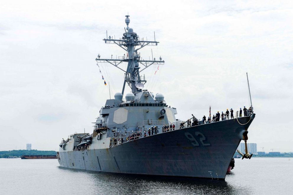 PHOTO: The guided-missile destroyer USS Momsen prepares to pull into Singapore for a regularly scheduled port visit.