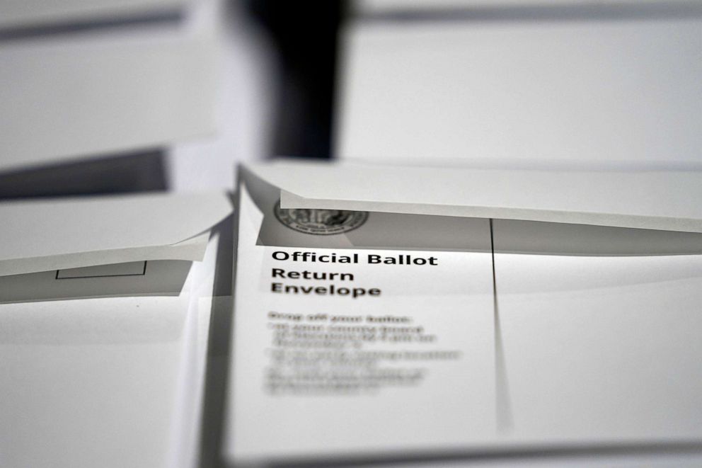 PHOTO: Stacks of ballot envelopes waiting to be mailed are seen at the Wake County Board of Elections in Raleigh, N.C., Sept. 3, 2020.