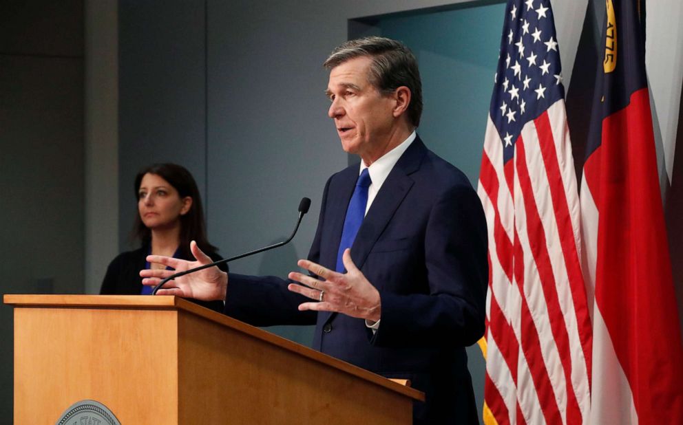 PHOTO: North Carolina Gov. Roy Cooper answers a question during a briefing on the coronavirus pandemic at the Joint Force Headquarters in Raleigh, N.C., May 20, 2020. 