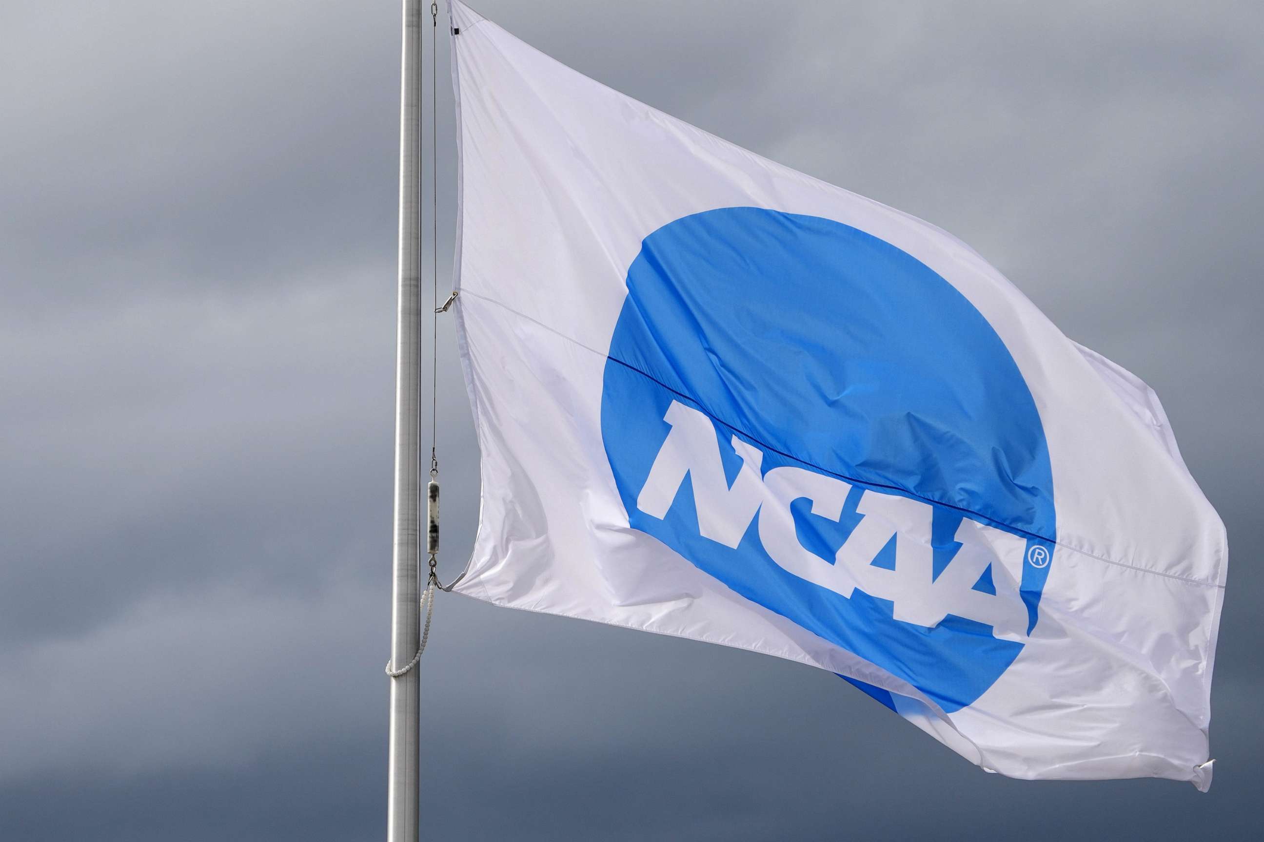 PHOTO: An NCAA logo flag at the NCAA Track and Field Championships at Hayward Field in Eugene, Ore., in this Jun 11, 2021 file photo. 