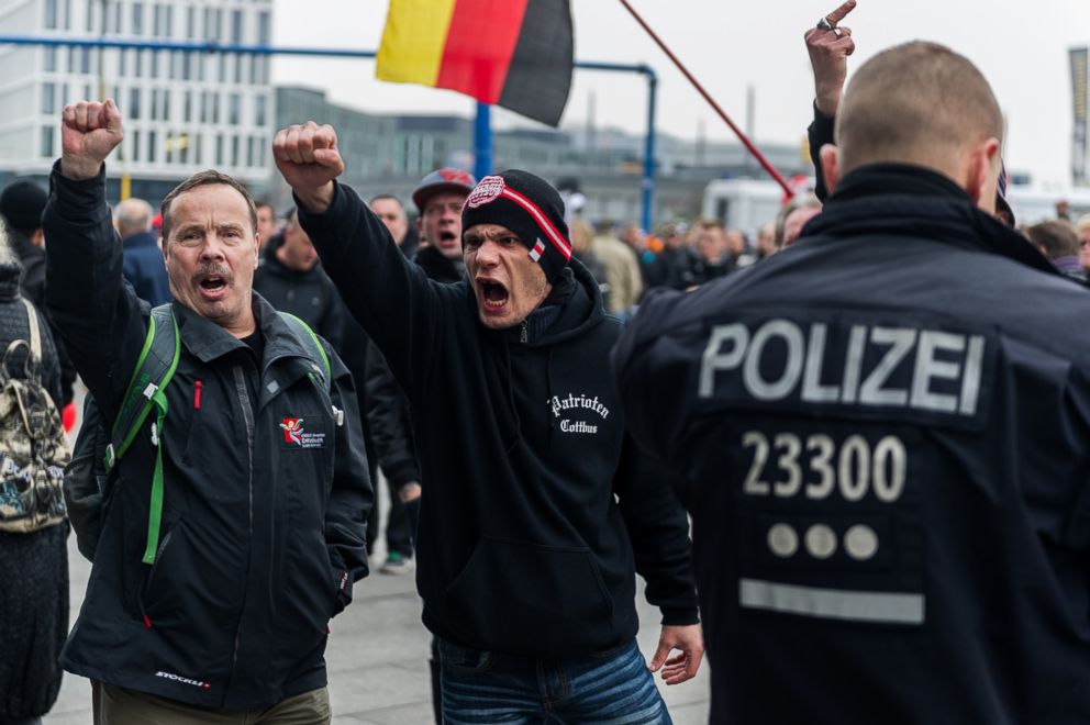 PHOTO: Right-wing activists shout slogans as they gather in front of Hauptbahnhof main railway station before marching through Berlin, Nov. 5, 2016.