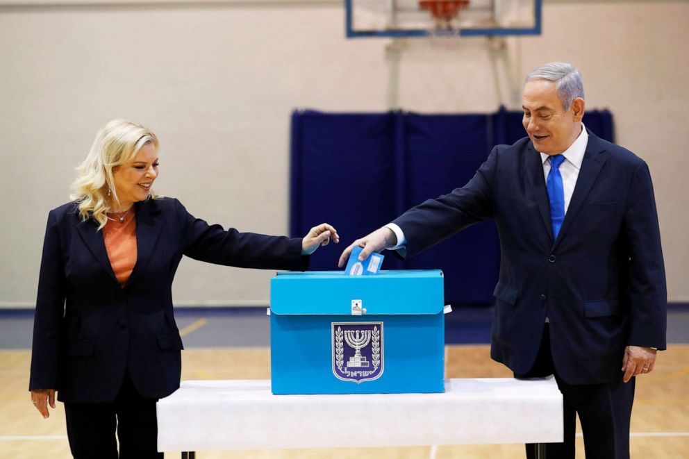 PHOTO: Israeli Prime Minister Benjamin Netanyahu and his wife Sara Netanyahu cast their ballots during the Israeli legislative elections at a polling station in Jerusalem, March 2, 2020. 