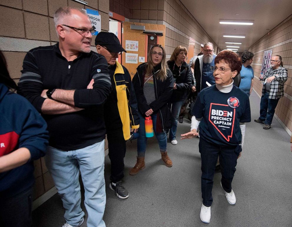 PHOTO: People wait to cast their votes during the Nevada caucuses to nominate a Democratic presidential candidate at the polling station inside the Coronado High School in Las Vegas on Feb. 22, 2020.