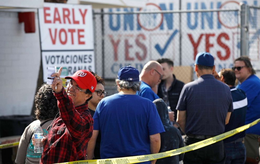 PHOTO: People wait in line to vote early at the Culinary Workers union, Feb. 17, 2020, in Las Vegas.