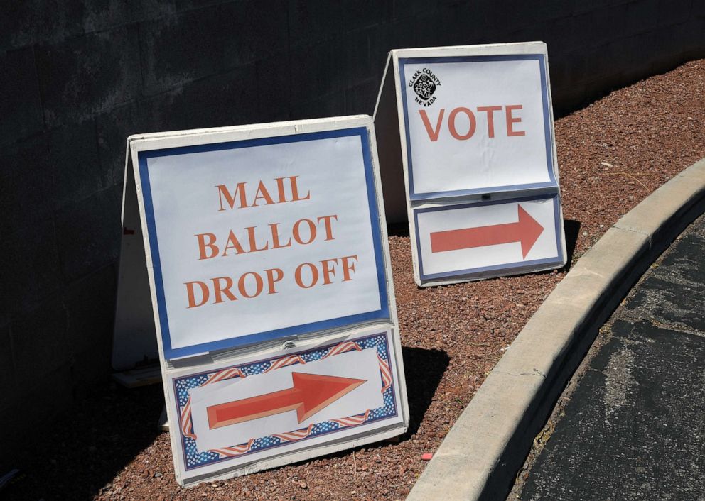 PHOTO:Signs direct people to the entrance of the Clark County Election Department, which is serving as both a primary election ballot drop-off point and an in-person voting center amid the coronavirus pandemic on June 9, 2020 in North Las Vegas.