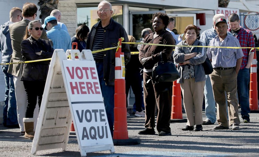 PHOTO: People wait in line to vote on the final day of early voting for the upcoming Nevada Democratic presidential caucus, Feb. 18, 2020, in Las Vegas, Nevada.