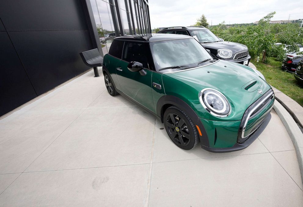 PHOTO: An unsold 2022 Cooper SE hardtop sits on display outside a Mini dealership, on May 24, 2022, in Highlands Ranch, Colo.