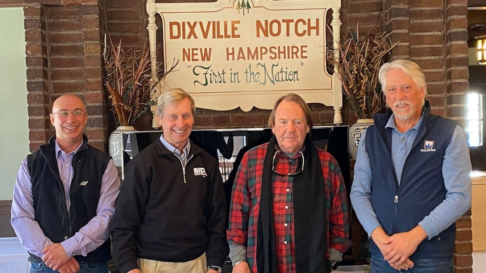 PHOTO: Former New Hampshire Gov. John Lynch, second from left, meets with three of the five voters in Dixville Notch, N.H.