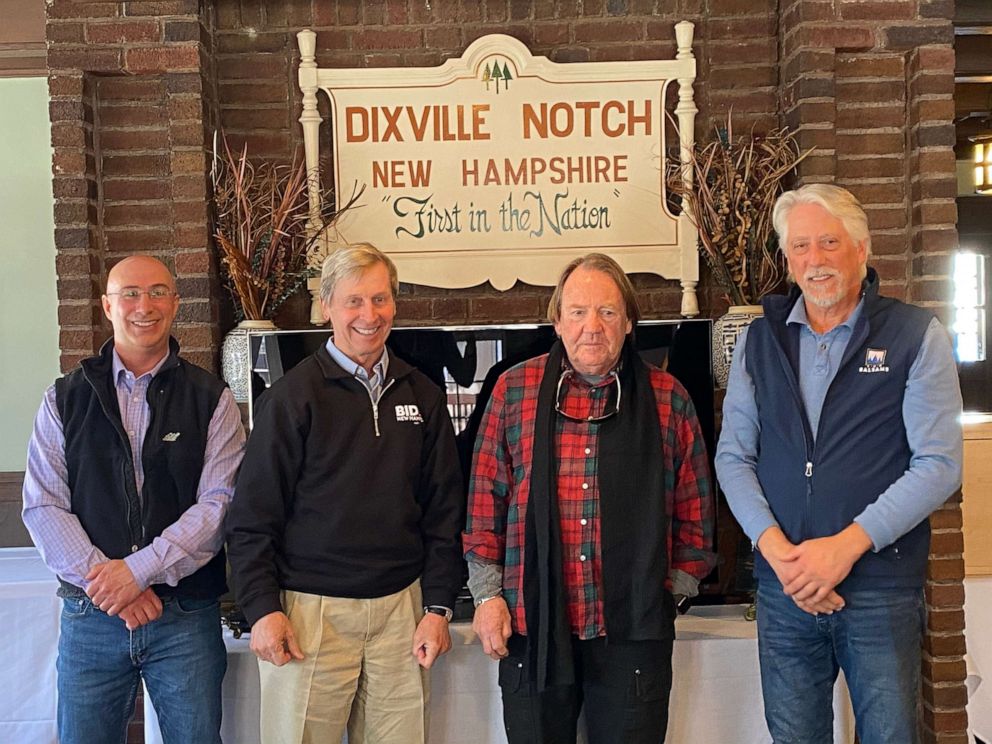 PHOTO: Former New Hampshire Gov. John Lynch, second from left, meets with three of the five voters in Dixville Notch, N.H.