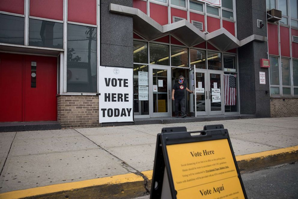 PHOTO:A voter leaves a polling location in Hoboken, N.J. during the primaries, July 7, 2020.