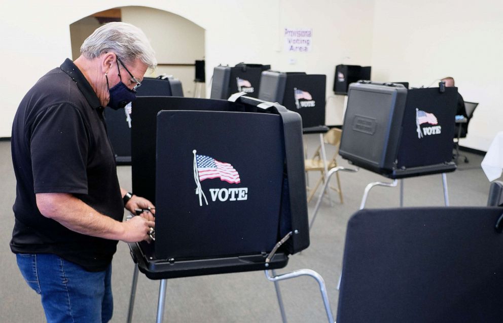 PHOTO: Robert Michael Smith casts his ballot at the Bernalillo County Annex located near Downtown Albuquerque, N.M., as Early Voting starts for the special election to replace the 1st Congressional seat  vacated by former Rep. Deb Haaland, May  4, 2021. 