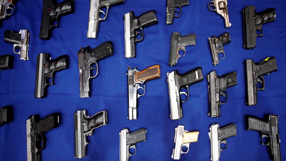 PHOTO: Seized handguns are pictured at the police headquarters in New York, Aug. 19, 2013.