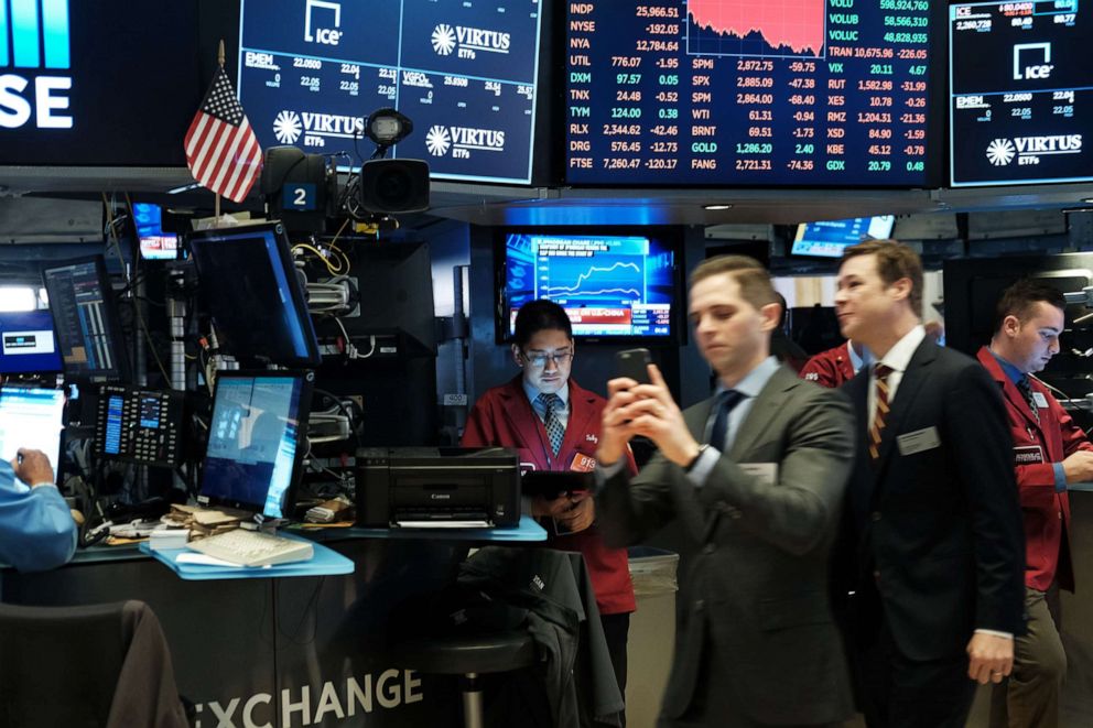 PHOTO: Traders work on the floor of the New York Stock Exchange, May 7, 2019, in New York City.