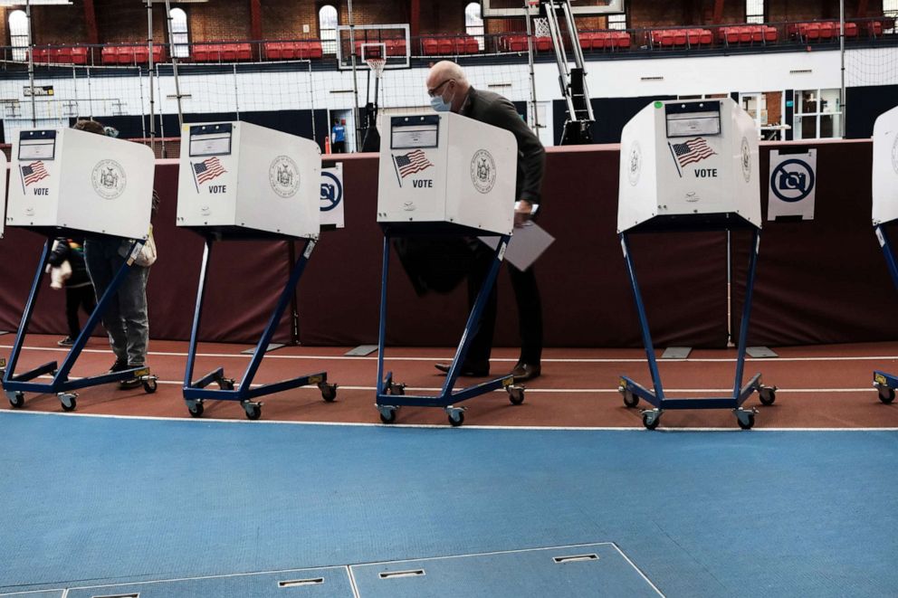 PHOTO: In this Nov. 2, 2021, file photo, people visit a voting site at a YMCA on Election Day in New York.