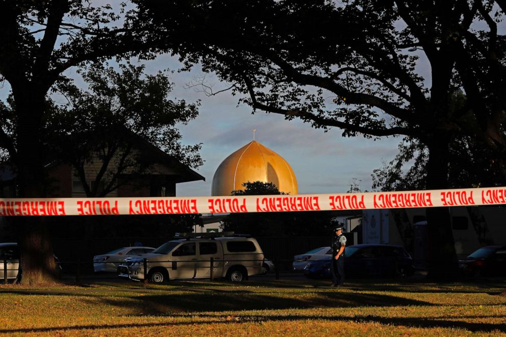 PHOTO: In this March 17, 2019, file photo, a police officer stands guard in front of the Masjid Al Noor mosque in Christchurch, New Zealand, where one of two mass shootings occurred.