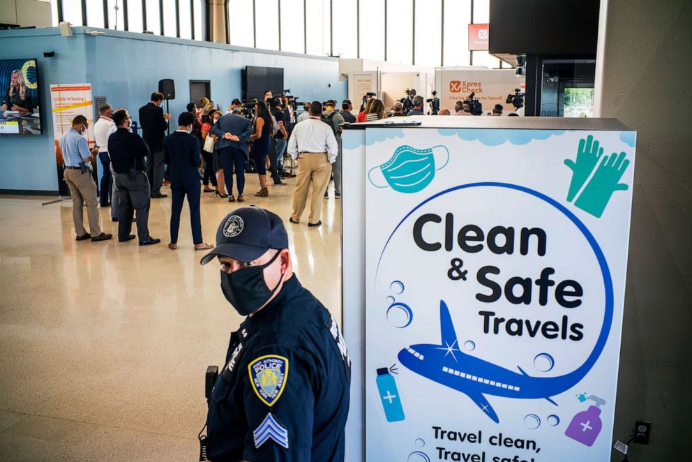 PHOTO: A Port Authority police officer stands watch on the day the new COVID-19 testing facility XpresCheck became available for passengers at Newark Liberty International Airport, Sept. 8, 2020 in Newark, N.J.